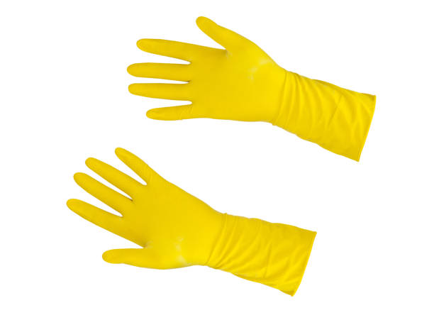 istock Yellow rubber gloves closeup isolated on a white background 1164855921