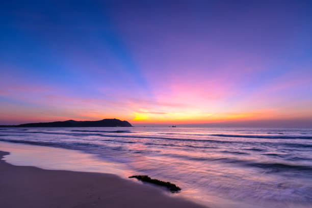 istock Dawn on the beautiful beach 1164858680