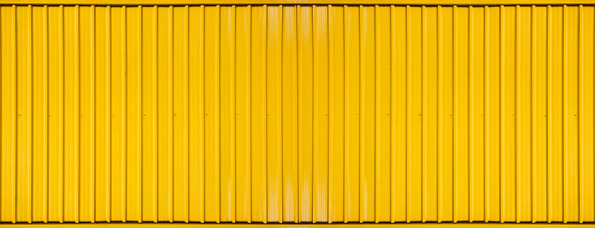 Fondo texturizado de línea rayada de contenedor de caja amarilla photo