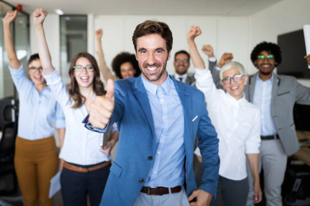 istock Successful business group of people at work in office 1164862040