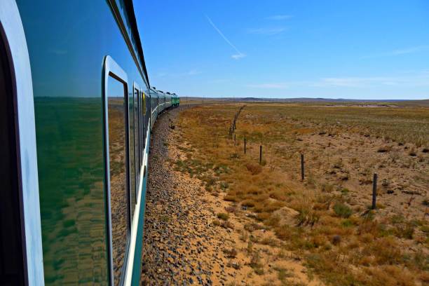 istock Transsiberian railway: train running through Mongolian steppe 1164866850
