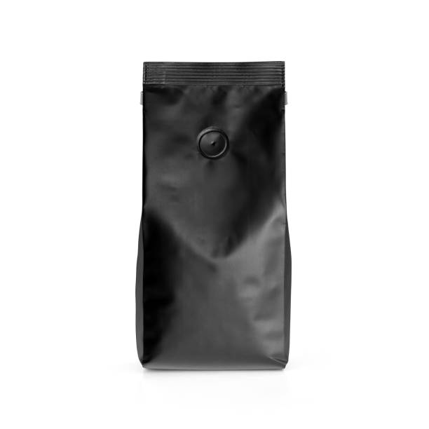 istock Black blank matte plastic paper bag front view isolated on white background. 1164867069