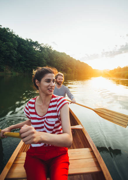 istock Couple enjoy canoeing 1164869244