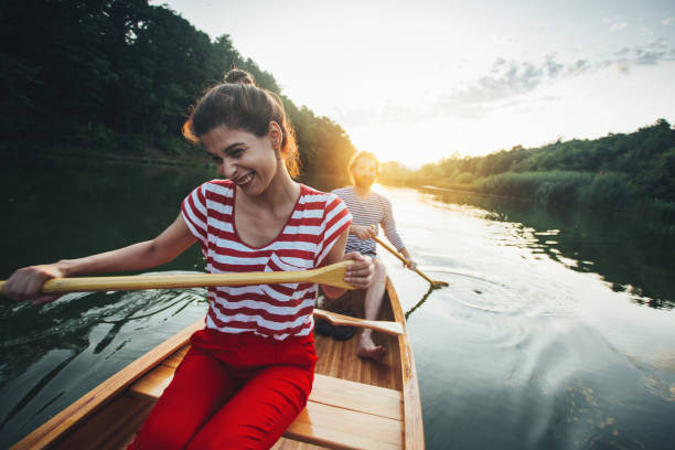 istock Couple enjoy canoeing 1164869246