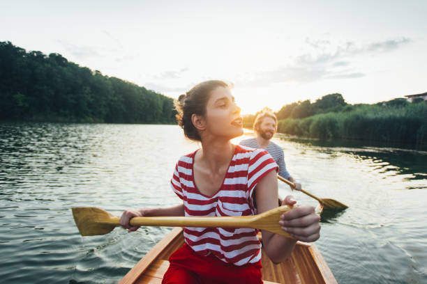 istock Couple enjoy canoeing 1164869248