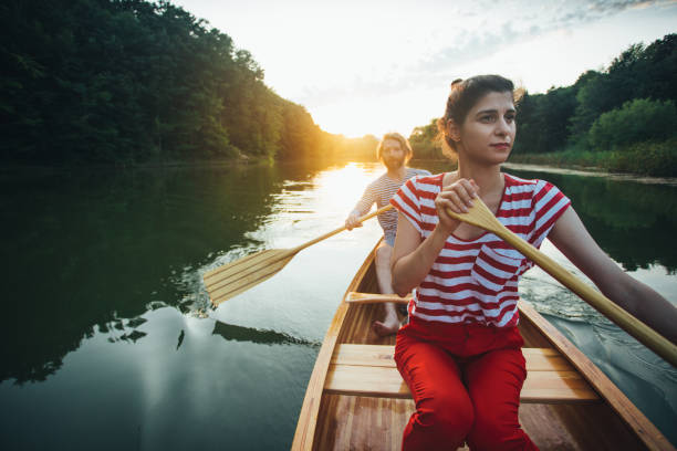 istock Couple enjoy canoeing 1164869249