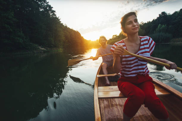 istock Couple enjoy canoeing 1164869251
