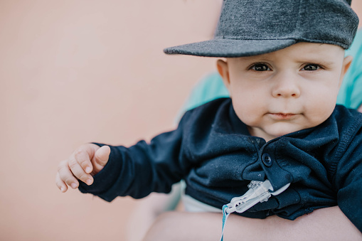 beautiful little boy with a cap