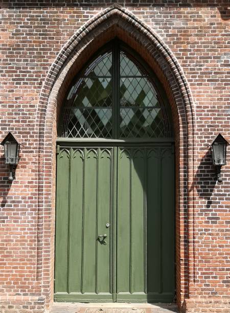 istock Old doors of buildings in Stade, Germany. 1164870890
