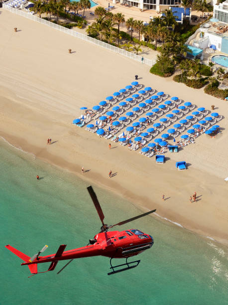 istock Helicopter flying over Miami Beach, Florida, USA. 1164874621