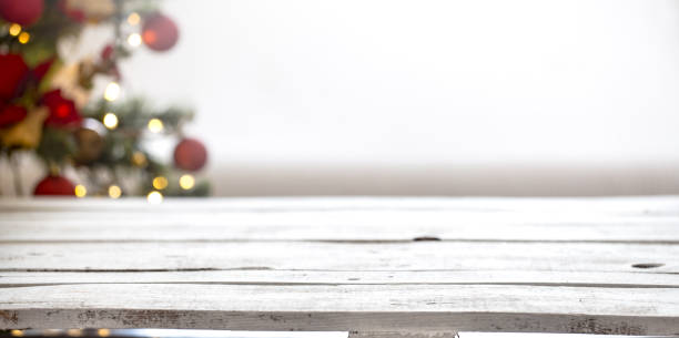 istock Christmas holiday background with empty wooden table top over festive bokeh light decorate. 1164876231