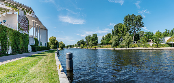 panoramic view of Spree river near Federal Chancellery in Berlin, Germany on sunny day in summer