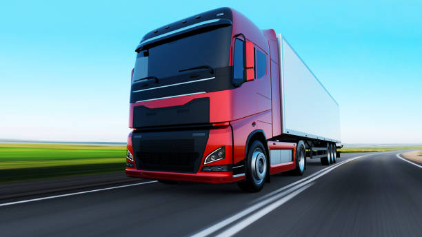 istock semi-truck with trailer driving on road 1164881042