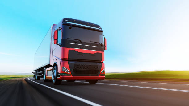 istock semi-truck with trailer driving on road 1164881043