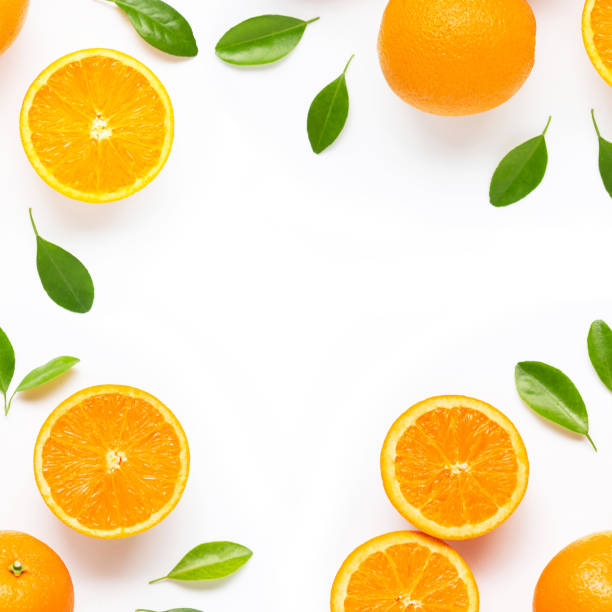 istock Frame made of fresh orange citrus fruit with leaves isolated on white background. 1164883936