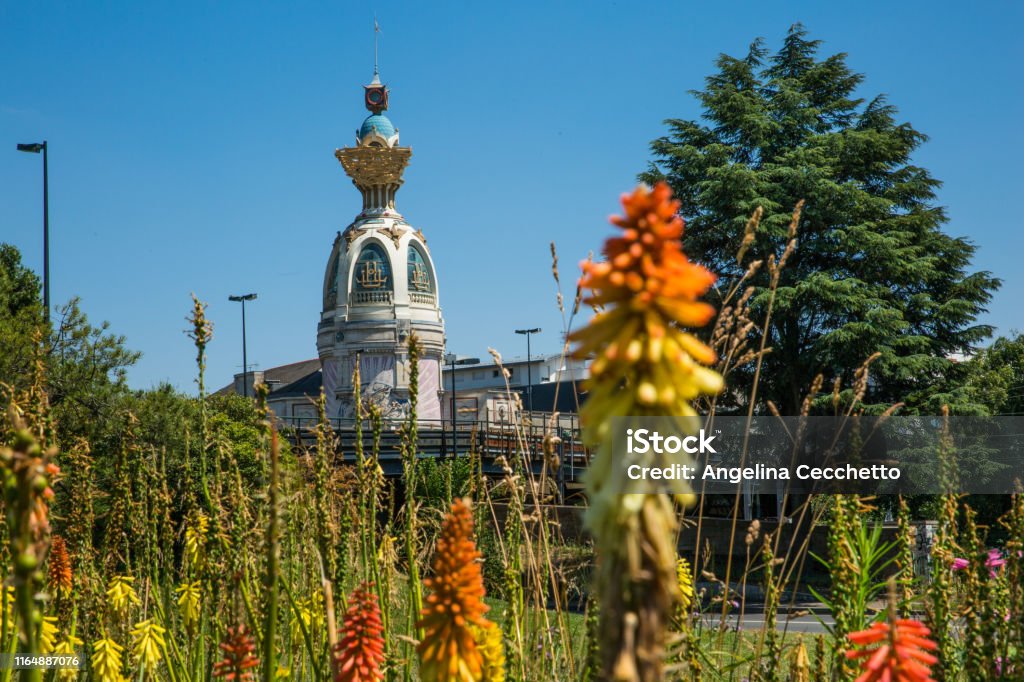 Tour Lu in Nantes on a Sunny Summer Day with Green Vegetation and Orange Common Torch Lilly Flowers Nantes Stock Photo