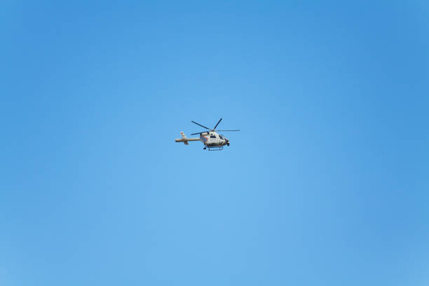 Belgian police helicopter over inner Brussels and Kunstberg and Grand Place.
