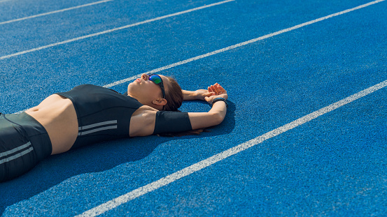 Lying Down, Running, Sports Track, Stadium, Resting