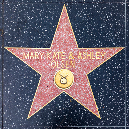 Los Angeles, USA - March 5, 2019: closeup of Star on the Hollywood Walk of Fame for Mary Kate and Ashley Olsen.