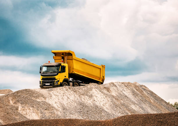 istock dump truck drops gravel 1164893756