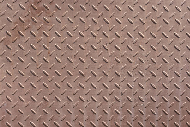 istock Corrugated metal surface with diamond plate texture. The diamond steel metal sheet.  Pattern of old metal diamond plate 1164895757