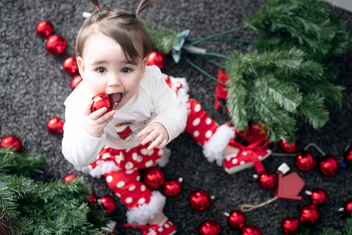 Beautiful little girl at first christmas party