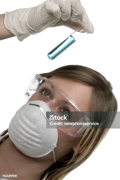 Researcher Analyzing A Test Tube Stock Photo - Download Image Now - Analyzing, Mask - Disguise, One Woman Only