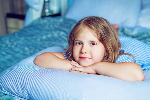 istock girl in bed 1164903045