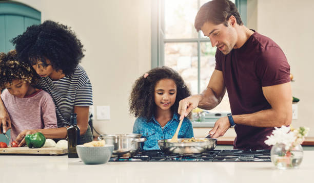 istock Cooking together creates stronger family relationships 1164904637