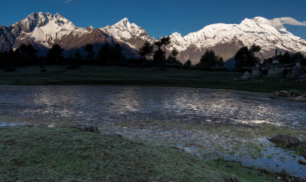 istock Snow mountain and village 1164906140