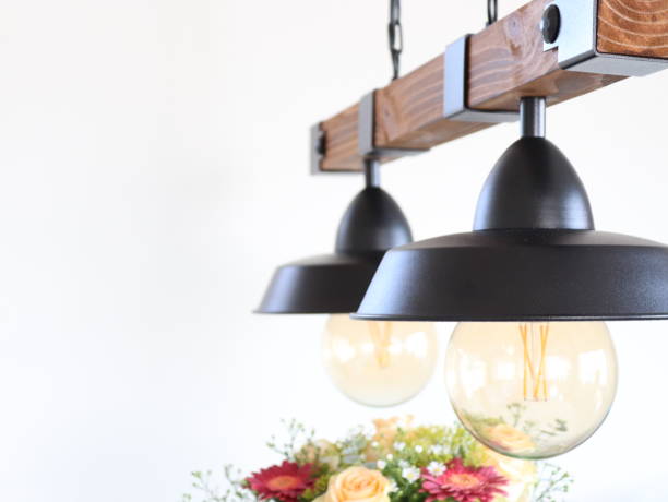 istock Hanging lamp over flowers 1164906646