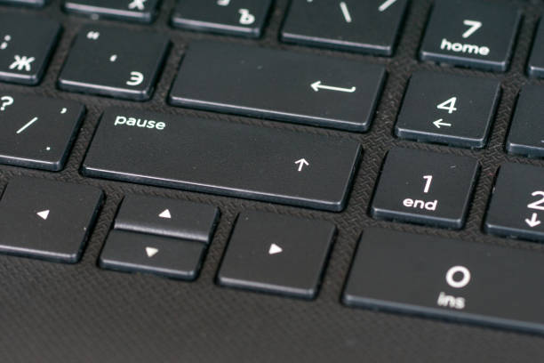 istock black keyboard with pause button in center, close up shot 1164908157
