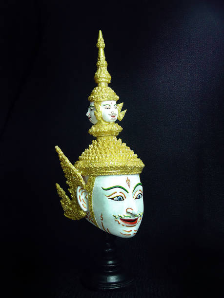 istock A model of thai actor's Khon mask on black background.(Thai traditional dance) Use in khon thai classical style of ramayana story. 1164909496