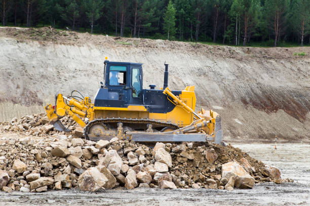 istock Bulldozer on the construction site of the road. 1164910397