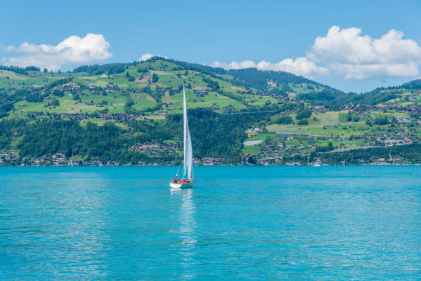 Spiez, Switzerland - June 17, 2019: Sailing boat on Lake Thun in Spiez in the Bernese Oberland of Switzerland