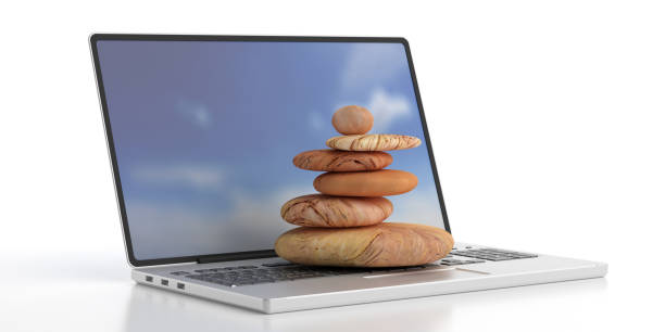 Zen stones on a computer isolated on white background. 3d illustration