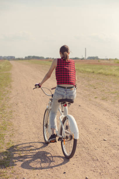 istock girl on bicycle 1164911390