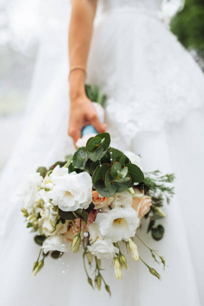 istock wedding flowers, bride holding beautiful flowers, decor 1164913697