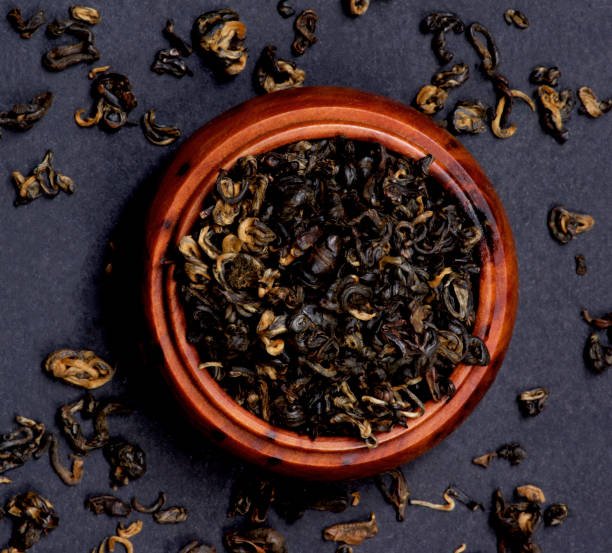 tè verde lumaca d'oro - tea jasmine tea green black foto e immagini stock
