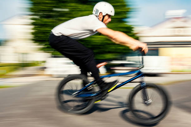 istock Young BMX bicycle rider 1164919234