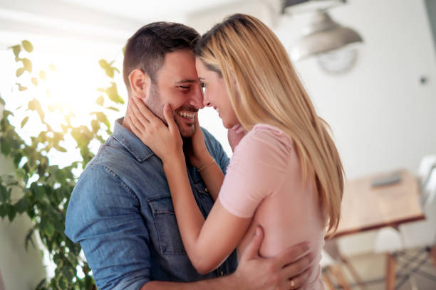 istock Happy young couple spending romantic day at home 1164920181