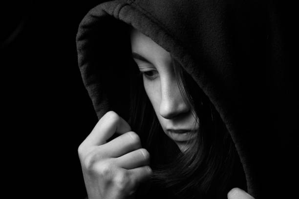 istock girl in hood 1164923592