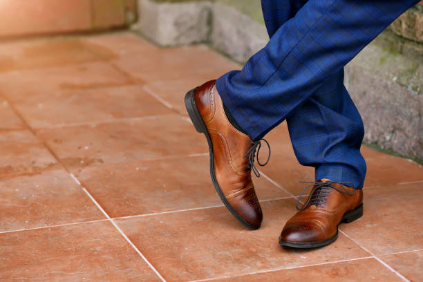 istock stylish brown mens shoes close-up 1164925251
