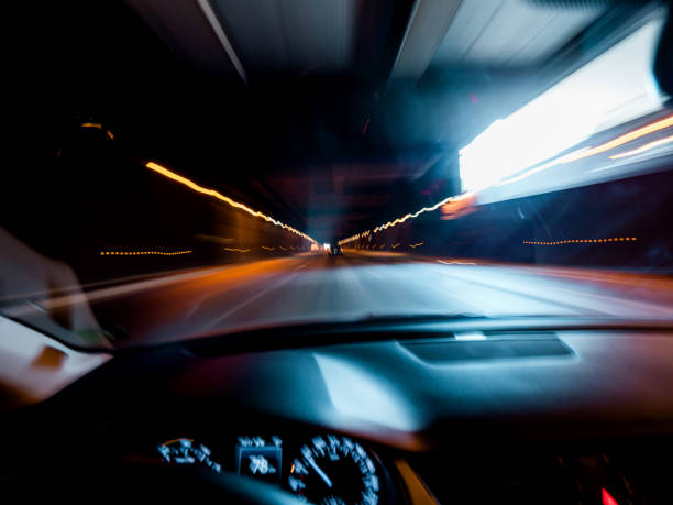 drunk vision driving car inside tunnel - skidding bend danger curve imagens e fotografias de stock