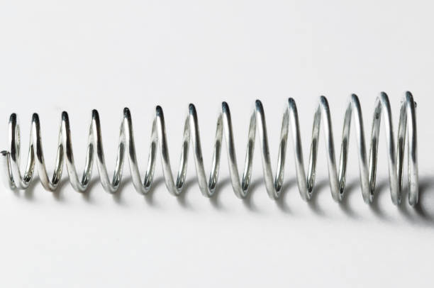 istock Metal gray spring isolated on white background 1164926028