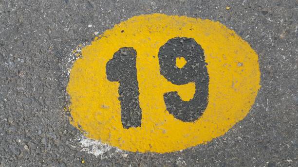istock Number yellow painting wallpaper 1164933498