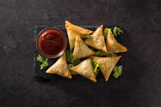 istock Samsa or samosas with meat and vegetables 1164935161