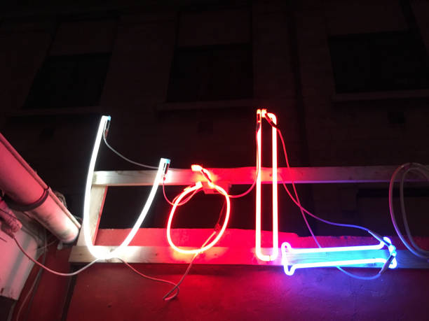 istock Old, neon, colorful lettering. 1164935376