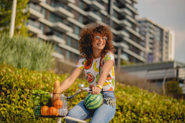 a young woman on a bicycle