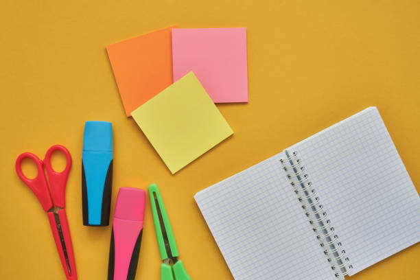 istock School subjects on a yellow background. Back to school concept. Flat lay, copy space 1164938000